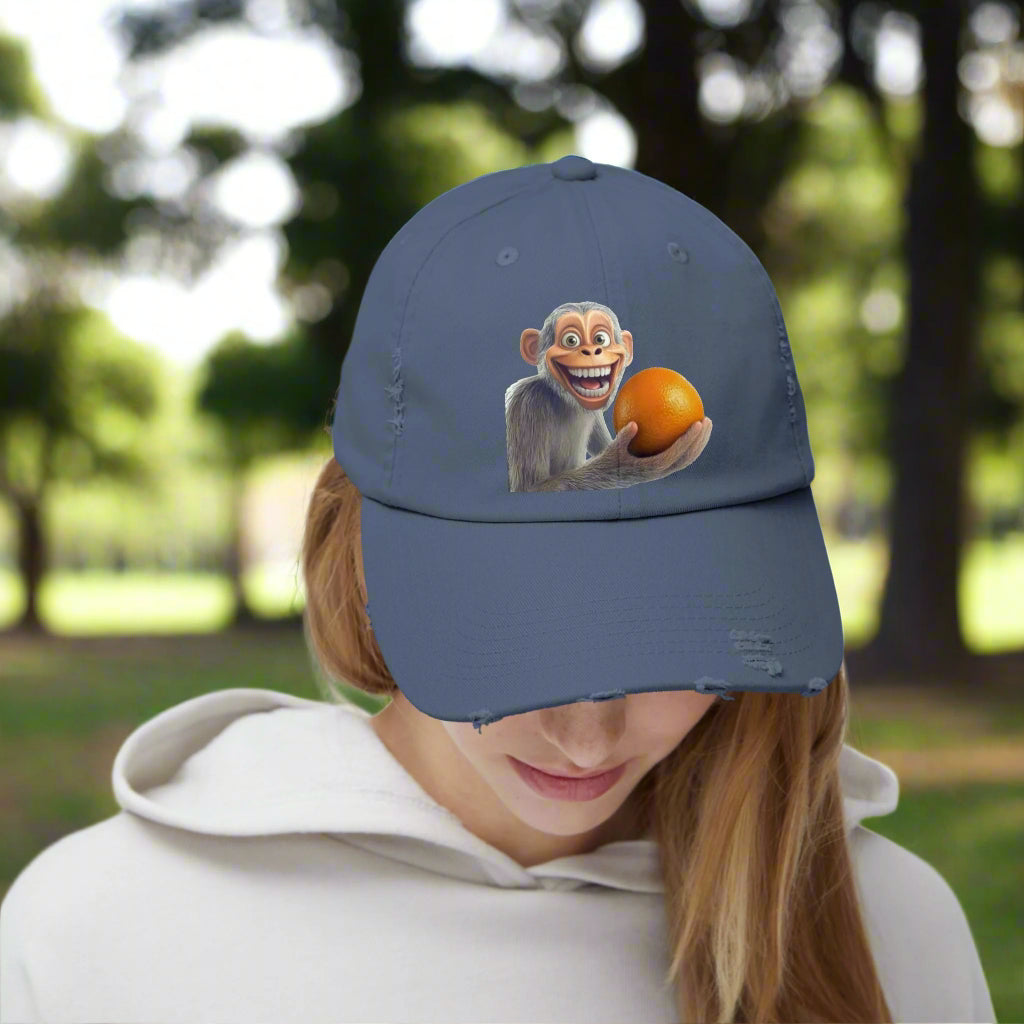 Monkey Holding Orange Unisex Distressed Cap