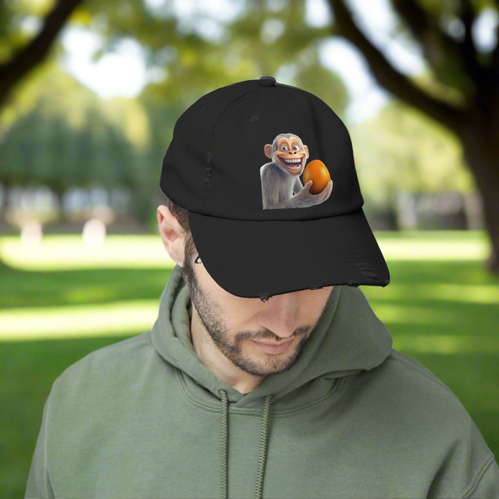 Monkey Holding Orange Unisex Distressed Cap