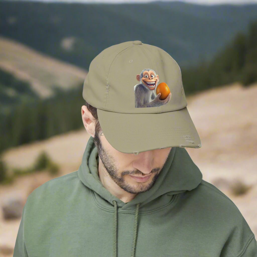 Monkey Holding Orange Unisex Distressed Cap